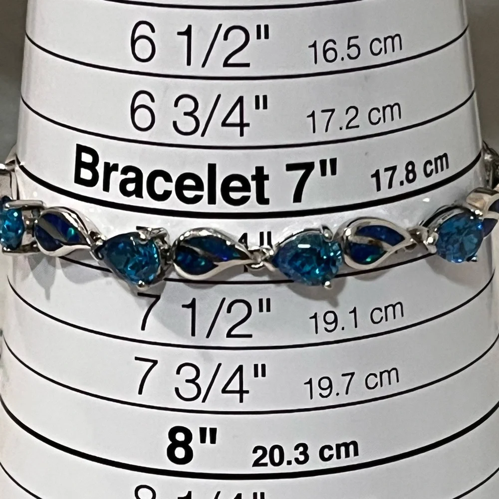 LOVED AUTHENTIC LONDON BLUE TOPAZ STONES/BLUE FIRE OPAL STERLING SILVER BRACELET
